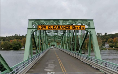 sign on bridge